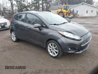 2018 Ford Fiesta SE with VIN 3FADP4EJ9JM126299, listed as a IAAI auction lot 41660973 with 74,730 mi miles. Bid and sale history available at carsss.com. Image 1.