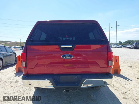2018 Ford F-150 XL z VIN 1FTEX1C5XJKD87760, wystawiony jako IAAI lot #42016828 z przebiegiem 121 297 mil mil oraz . Historia ofert i sprzedaży dostępna na DreamBid. Obrazek 16.