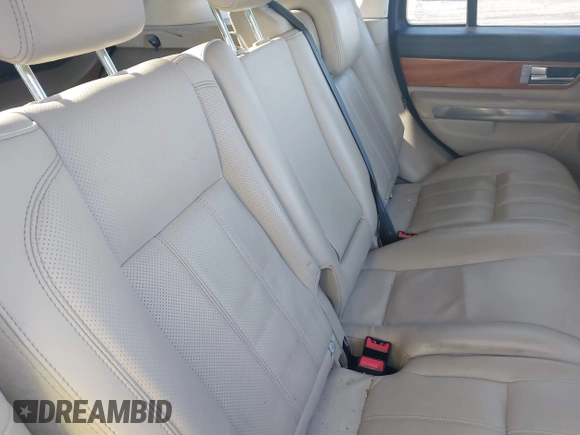 2010 Land Rover Range Rover Sport HSE Lux z VIN SALSK2D40AA225986, wystawiony jako IAAI lot #41972061 z przebiegiem 93 440 mil mil oraz . Historia ofert i sprzedaży dostępna na DreamBid. Obrazek 8.