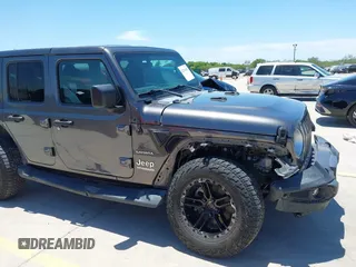 2018 Jeep Wrangler Unlimited Sahara with VIN 1C4HJXEN1JW236779, listed as a IAAI auction lot 42238158 with 72,879 mi miles and . Bid and sale history available at DreamBid. Image 6.