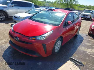 2020 Toyota Prius L Eco z VIN JTDKARFUXL3114644, wystawiony jako IAAI lot #42075713 z przebiegiem 78 853 mil mil oraz . Historia ofert i sprzedaży dostępna na DreamBid. Obrazek 2.