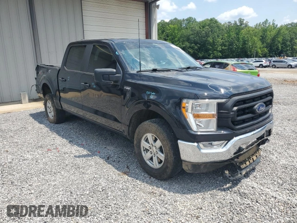 2022 Ford F-150 XL with VIN 1FTFW1E51NFA04887, listed as a Copart auction lot 55734705 with 123,590 mi miles and Salvage title. Bid and sale history available at DreamBid. Image 4.