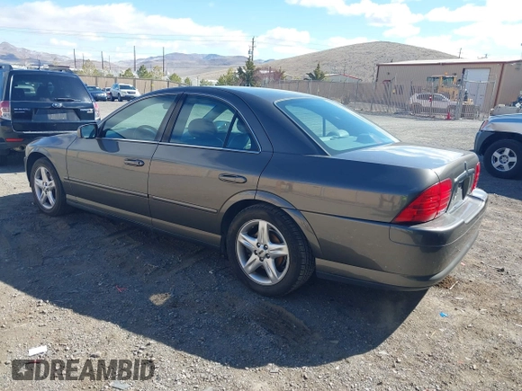 2002 Lincoln LS w/Base Pkg with VIN 1LNHM87A02Y706583, listed as a IAAI auction lot 41809363 with 131,313 mi miles. Bid and sale history available at carsss.com. Image 3.
