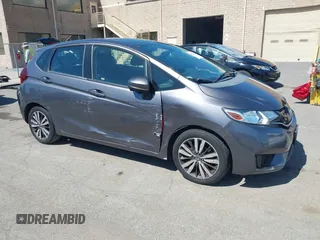 2015 Honda Fit EX-L z VIN 3HGGK5H86FM746265, wystawiony jako IAAI lot #42253205 z przebiegiem 75 491 mil mil oraz . Historia ofert i sprzedaży dostępna na DreamBid. Obrazek 1.