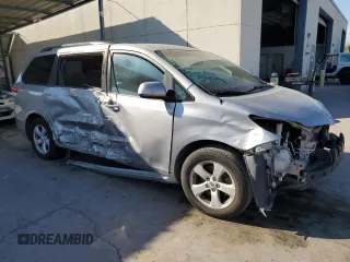 2012 Toyota Sienna LE AAS with VIN 5TDKK3DC8CS259085, listed as a Copart auction lot 73592584 with 198,370 mi miles and Salvage Title. Bid and sale history available at DreamBid. Image 4.