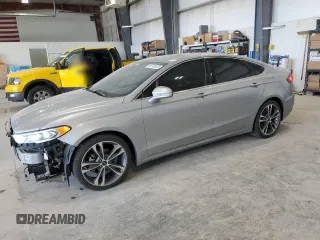 2020 Ford Fusion Titanium with VIN 3FA6P0K90LR112034, listed as a Copart auction lot 56740025 with 89,117 mi miles and Salvage title. Bid and sale history available at DreamBid. Image 1.