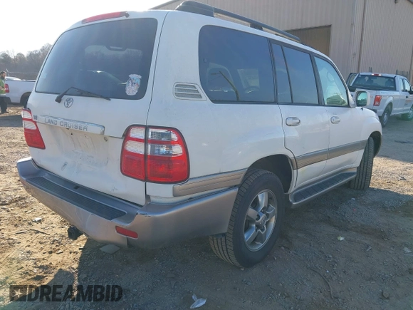 2005 Toyota Land Cruiser z VIN JTEHT05J952078683, wystawiony jako IAAI lot #41769150 z przebiegiem 299 737 mil mil oraz . Historia ofert i sprzedaży dostępna na DreamBid. Obrazek 4.