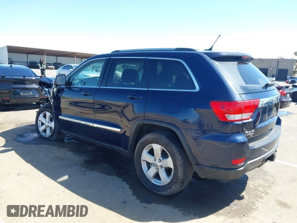 2012 Jeep Grand Cherokee Laredo with VIN 1C4RJFAG0CC160255, listed as a IAAI auction lot 41967809 with 127,702 mi miles. Bid and sale history available at carsss.com. Image 3.