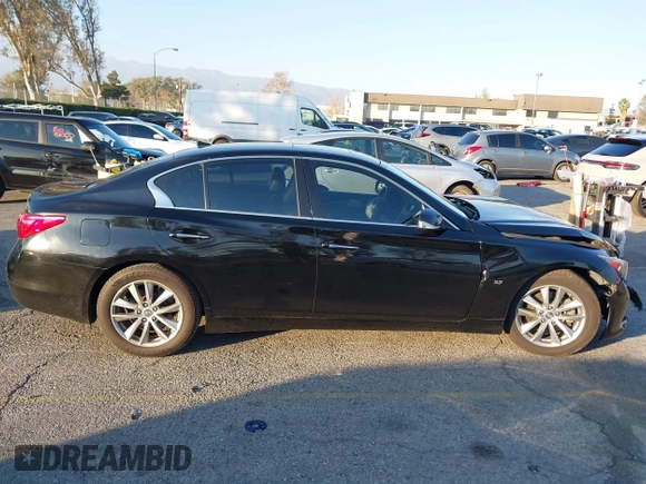2015 Infiniti Q50 Premium z VIN JN1BV7AP5FM346323, wystawiony jako IAAI lot #41305093 z przebiegiem 112 556 mil mil oraz . Historia ofert i sprzedaży dostępna na DreamBid. Obrazek 13.