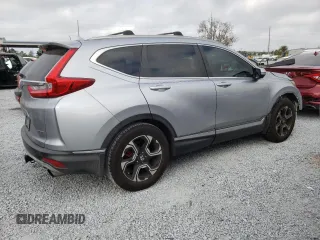 2018 Honda CR-V Touring with VIN 7FARW1H93JE055337, listed as a Copart auction lot 45045305 with 74,776 mi miles and Salvage Title. Bid and sale history available at DreamBid. Image 3.