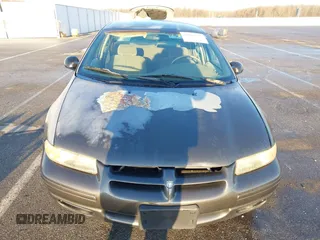 2000 Dodge Stratus z VIN 1B3EJ46X5YN133643, wystawiony jako IAAI lot #41863523 z przebiegiem 181 283 mil mil oraz . Historia ofert i sprzedaży dostępna na DreamBid. Obrazek 6.