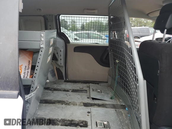 2014 Ram Cargo Van Tradesman with VIN 2C4JRGAG1ER316163, listed as a Copart auction lot 66036454 with Not Provided miles and Salvage Title. Bid and sale history available at DreamBid. Image 10.