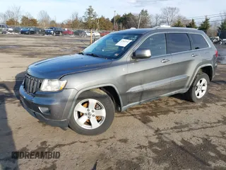 2011 Jeep Grand Cherokee 70th Anniversary with VIN 1J4RR4GT6BC715848, listed as a IAAI auction lot 41562152 with 119,910 mi miles. Bid and sale history available at carsss.com. Image 17.