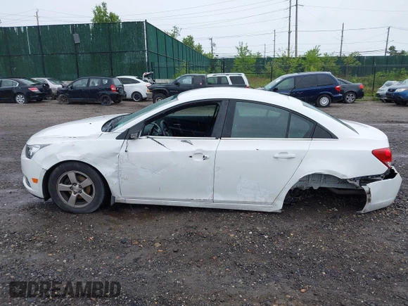 2014 Chevrolet Cruze 1LT with VIN 1G1PC5SB6E7233051, listed as a IAAI auction lot 42214334 with 88,389 mi miles and . Bid and sale history available at DreamBid. Image 14.