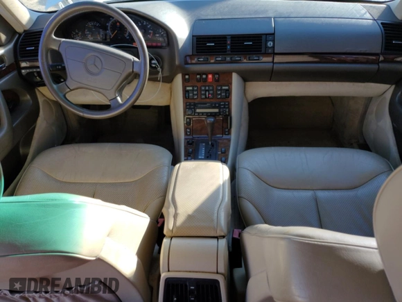 1995 Mercedes-Benz S with VIN WDBGA51E1SA225395, listed as a Copart auction lot 81313224 with 128,402 mi miles and Clean Title. Bid and sale history available at DreamBid. Image 8.