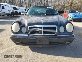 1996 Mercedes-Benz E Class with VIN WDBJF20F9TJ023003, listed as a Copart auction lot 86356784 with 230,944 mi miles and Salvage Title. Bid and sale history available at carsss.com. Image 5.
