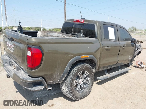 2023 GMC Canyon 4WD AT4 with VIN 1GTP6DEK5P1231432, listed as a IAAI auction lot 41785102 with 33,154 mi miles and . Bid and sale history available at carsss.com. Image 4.
