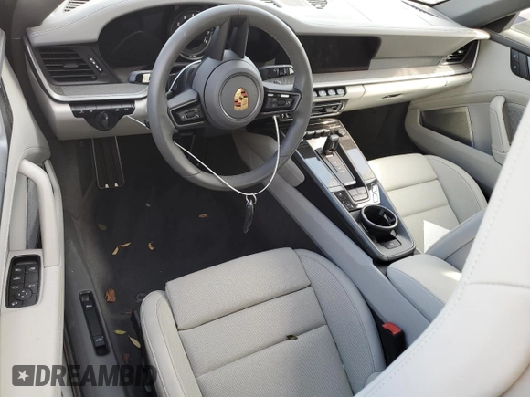 2022 Porsche 911 Carrera S z VIN WP0CB2A9XNS245285, wystawiony jako Copart lot #74853254 z przebiegiem Nie podano mil oraz Nie do naprawy • Non repairable. Historia ofert i sprzedaży dostępna na DreamBid. Obrazek 8.