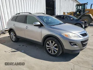 2012 Mazda CX-9 Grand Touring z VIN JM3TB3DV3C0335330, wystawiony jako Copart lot #57562015 z przebiegiem 171 397 mil mil oraz Szkody całkowita. Historia ofert i sprzedaży dostępna na DreamBid. Obrazek 4.