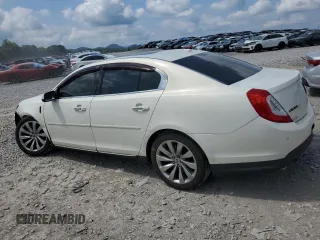 2013 Lincoln MKS with VIN 1LNHL9EK8DG605675, listed as a Copart auction lot 62448455 with 102,642 mi miles and Salvage title. Bid and sale history available at DreamBid. Image 2.