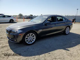 2015 BMW 5 Series 535i with VIN WBA5B1C51FD917833, listed as a Copart auction lot 60493095 with 51,595 mi miles and Salvage title. Bid and sale history available at DreamBid. Image 1.
