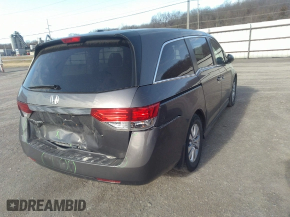 2014 Honda Odyssey EX-L with VIN 5FNRL5H64EB037646, listed as a IAAI auction lot 41786768 with 116,491 mi miles and . Bid and sale history available at carsss.com. Image 4.