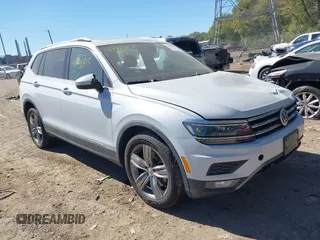 2018 Volkswagen Tiguan SEL Premium with VIN 3VV5B7AX5JM004713, listed as a IAAI auction lot 40498843 with 92,256 mi miles and . Bid and sale history available at DreamBid. Image 1.
