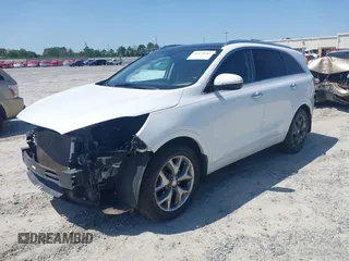 2016 Kia Sorento SX z VIN 5XYPK4A53GG183618, wystawiony jako IAAI lot #41976663 z przebiegiem 141 355 mil mil oraz . Historia ofert i sprzedaży dostępna na DreamBid. Obrazek 2.