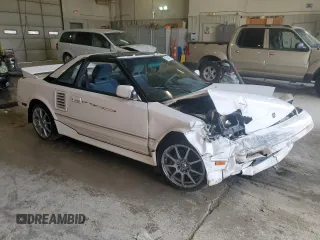 1989 Toyota MR2 z VIN JT2AW15J7K0154517, wystawiony jako Copart lot #77944134 z przebiegiem 204 412 mil mil oraz Szkody całkowita. Historia ofert i sprzedaży dostępna na DreamBid. Obrazek 4.