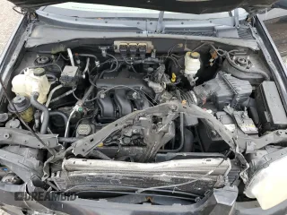 2005 Ford Escape Limited z VIN 1FMYU04135KB19386, wystawiony jako Copart lot #51686515 z przebiegiem Nie podano mil oraz Szkoda całkowita • Salvage title. Historia ofert i sprzedaży dostępna na DreamBid. Obrazek 11.