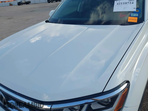 2021 Volkswagen Atlas SEL with VIN 1V2BR2CAXMC522670, listed as a IAAI auction lot 42110724 with 58,802 mi miles and . Bid and sale history available at DreamBid. Image 6.