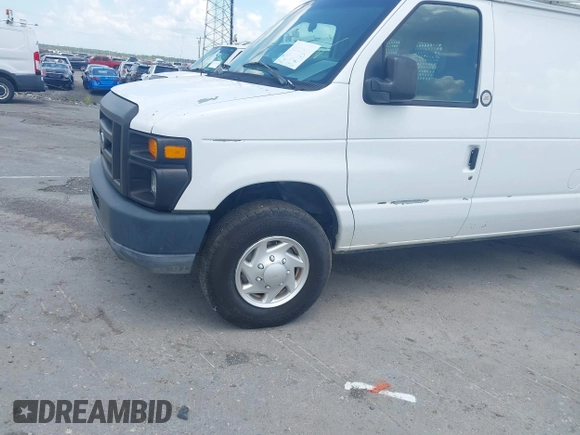 2011 Ford Econoline Cargo Commercial with VIN 1FTNE2EL4BDA70800, listed as a IAAI auction lot 42523533 with 139,962 mi miles and . Bid and sale history available at DreamBid. Image 18.