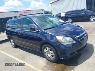 2006 Honda Odyssey EX-L z VIN 5FNRL38706B020471, wystawiony jako IAAI lot #42311534 z przebiegiem 123 719 mil mil oraz . Historia ofert i sprzedaży dostępna na DreamBid. Obrazek 1.