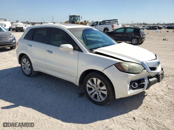 2010 Acura RDX with VIN 5J8TB2H21AA000692, listed as a Copart auction lot 76002204 with 110,544 mi miles and Salvage Title. Bid and sale history available at carsss.com. Image 4.