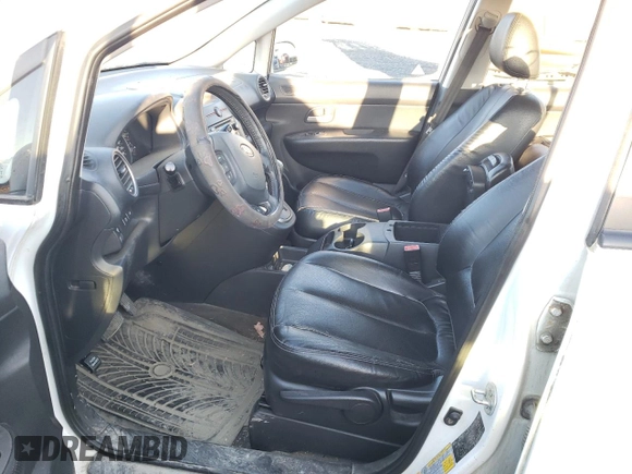 2009 Kia Rondo LX Base with VIN KNAFG528597268730, listed as a Copart auction lot 77071064 with 151,159 mi miles and Salvage Title. Bid and sale history available at carsss.com. Image 7.