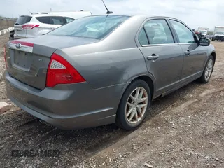 2011 Ford Fusion SEL with VIN 3FAHP0JA2BR246353, listed as a IAAI auction lot 42188279 with 112,641 mi miles. Bid and sale history available at carsss.com. Image 4.
