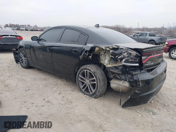 2019 Dodge Charger SXT with VIN 2C3CDXJG7KH757728, listed as a IAAI auction lot 41797017 with 68,063 mi miles and . Bid and sale history available at DreamBid. Image 3.
