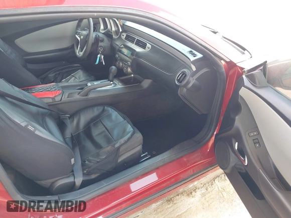 2014 Chevrolet Camaro LS z VIN 2G1FA1E32E9147104, wystawiony jako IAAI lot #42324064 z przebiegiem 70 585 mil mil oraz . Historia ofert i sprzedaży dostępna na DreamBid. Obrazek 5.