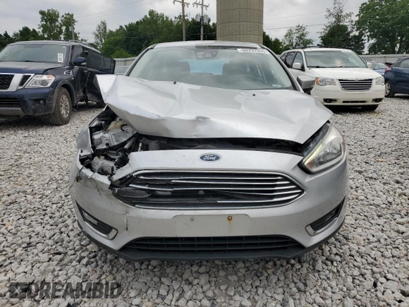 2017 Ford Focus Titanium with VIN 1FADP3N20HL320461, listed as a Copart auction lot 60292955 with 76,319 mi miles and Clean title. Bid and sale history available at DreamBid. Image 5.