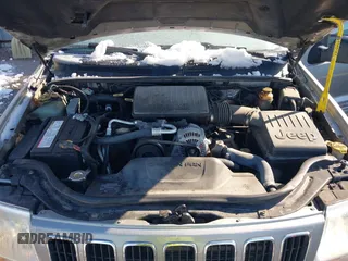 2001 Jeep Grand Cherokee Limited with VIN 1J4GW58N91C688438, listed as a IAAI auction lot 41830334 with 184,420 mi miles. Bid and sale history available at carsss.com. Image 10.