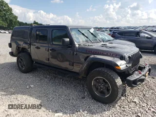 2021 Jeep Gladiator Rubicon with VIN 1C6JJTBG3ML602478, listed as a Copart auction lot 58138705 with 76,759 mi miles and Salvage title. Bid and sale history available at DreamBid. Image 4.