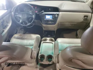 2000 Honda Odyssey EX with VIN 2HKRL1875YH611548, listed as a Copart auction lot 56593275 with 191,533 mi miles and Salvage title. Bid and sale history available at DreamBid. Image 8.
