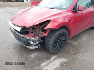 2023 Tesla Model Y Long Range with VIN 7SAYGDEE1PA169031, listed as a IAAI auction lot 41660766 with 35,253 mi miles and . Bid and sale history available at DreamBid. Image 6.