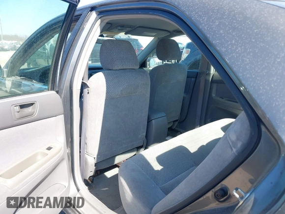 2003 Toyota Camry LE with VIN 4T1BE32K63U659008, listed as a IAAI auction lot 41790929 with 206,878 mi miles and . Bid and sale history available at DreamBid. Image 8.