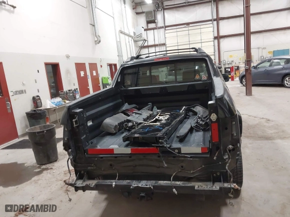 2014 Honda Ridgeline SE with VIN 5FPYK1F63EB013811, listed as a IAAI auction lot 41422016 with 168,653 mi miles. Bid and sale history available at carsss.com. Image 16.