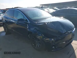 2017 Tesla Model X 90D with VIN 5YJXCBE26HF069008, listed as a IAAI auction lot 41193101 with 77,298 mi miles and . Bid and sale history available at DreamBid. Image 1.