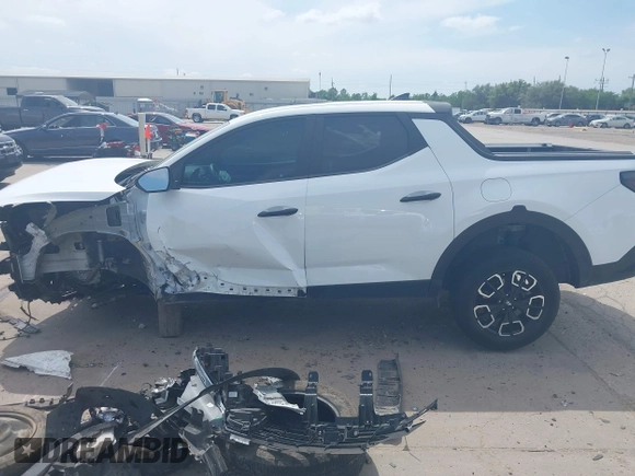 2022 Hyundai Santa Cruz SEL z VIN 5NTJBDAE5NH007005, wystawiony jako IAAI lot #42058065 z przebiegiem 30 825 mil mil oraz . Historia ofert i sprzedaży dostępna na DreamBid. Obrazek 15.