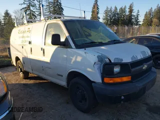 2006 Chevrolet Express Cargo Van with VIN 1GCGG25V061137999, listed as a IAAI auction lot 41451436 with 147,540 mi miles. Bid and sale history available at carsss.com. Image 1.