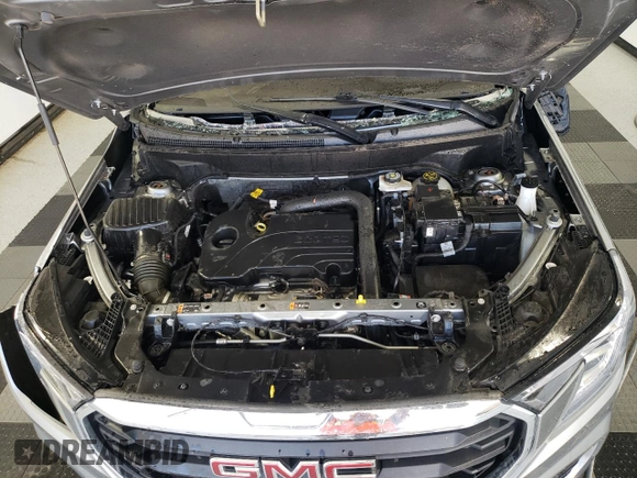 2023 GMC Terrain SLE with VIN 3GKALMEGXPL210714, listed as a Copart auction lot 49721045 with 69,677 mi miles and Salvage Title. Bid and sale history available at DreamBid. Image 12.