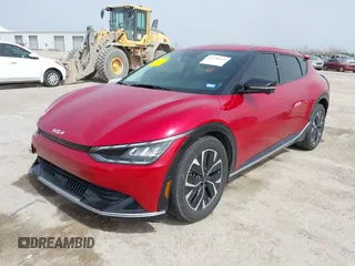 2022 Kia EV6 Wind z VIN KNDC3DLC6N5089018, wystawiony jako IAAI lot #41748175 z przebiegiem 25 157 mil mil oraz . Historia ofert i sprzedaży dostępna na DreamBid. Obrazek 2.